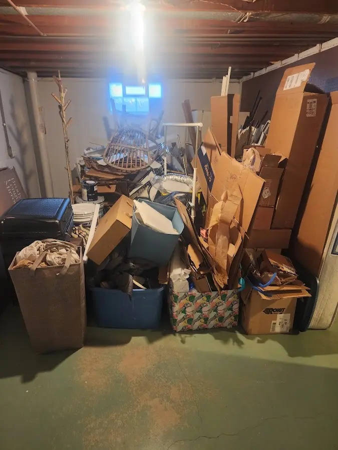 Roll-off dumpster container at job site for 20 Yard Dumpster Rental in Melwood